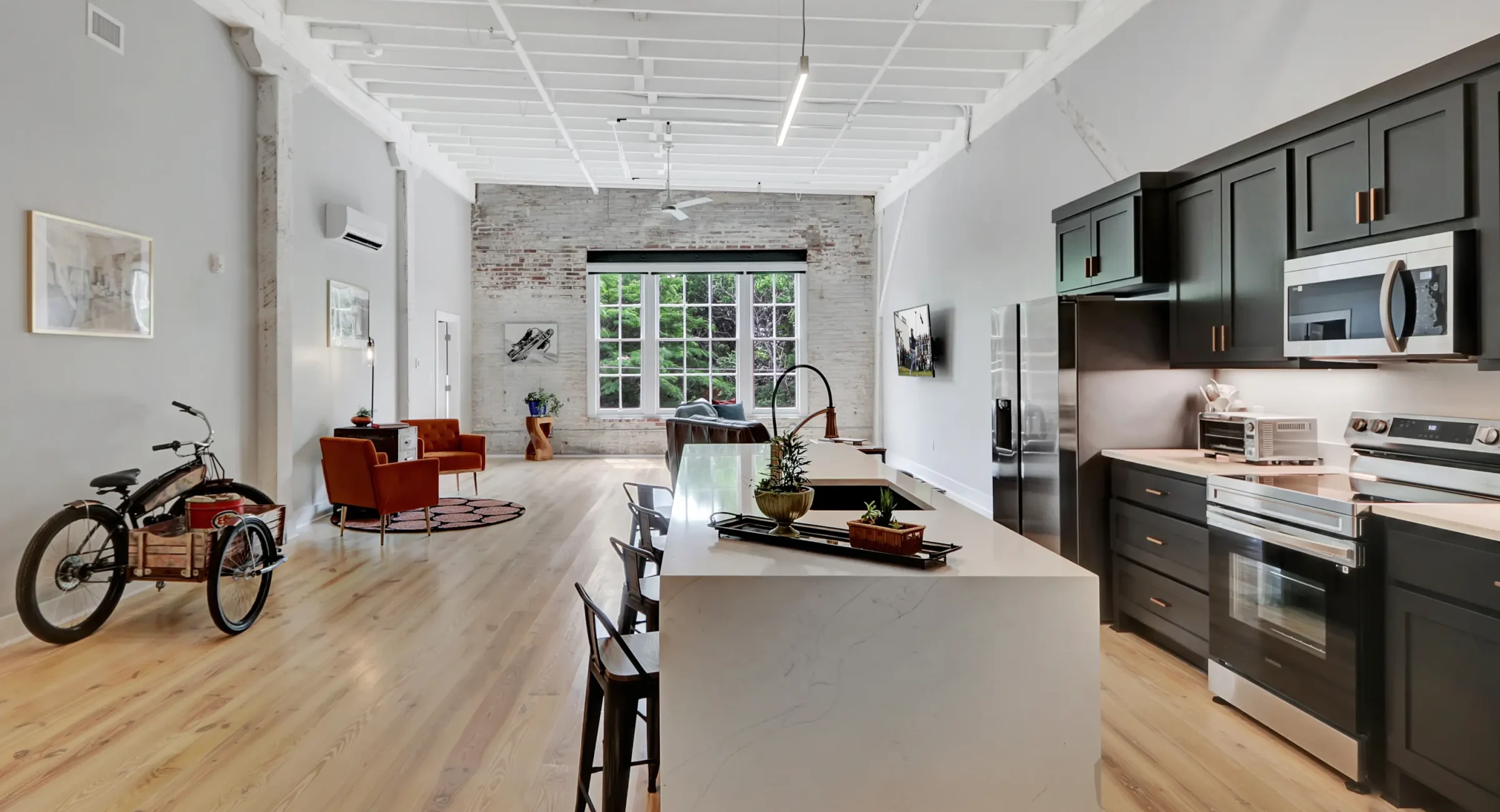 Open loft-style living space at downtown Hot Springs accommodations
