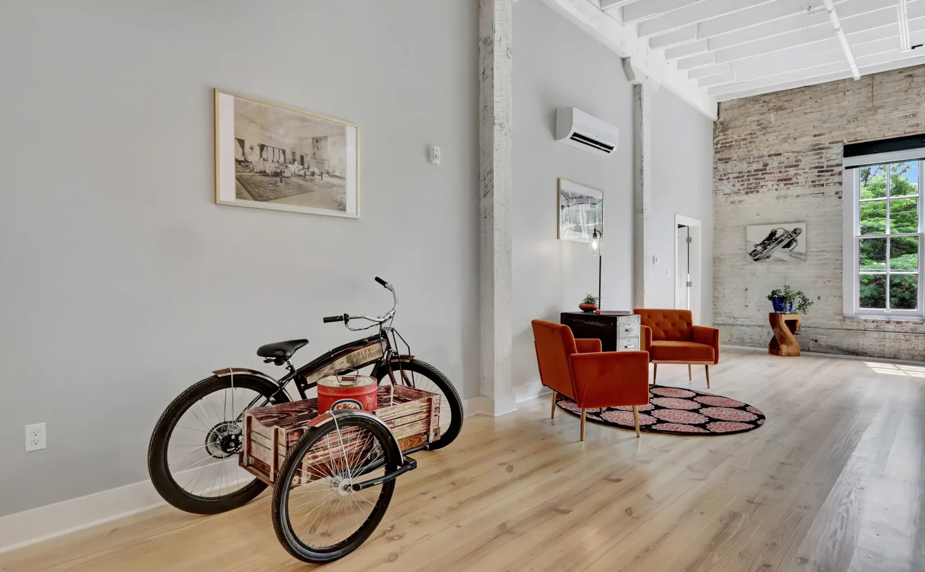 Vintage-style bike decor in spacious industrial living space Central Arkansas accommodations