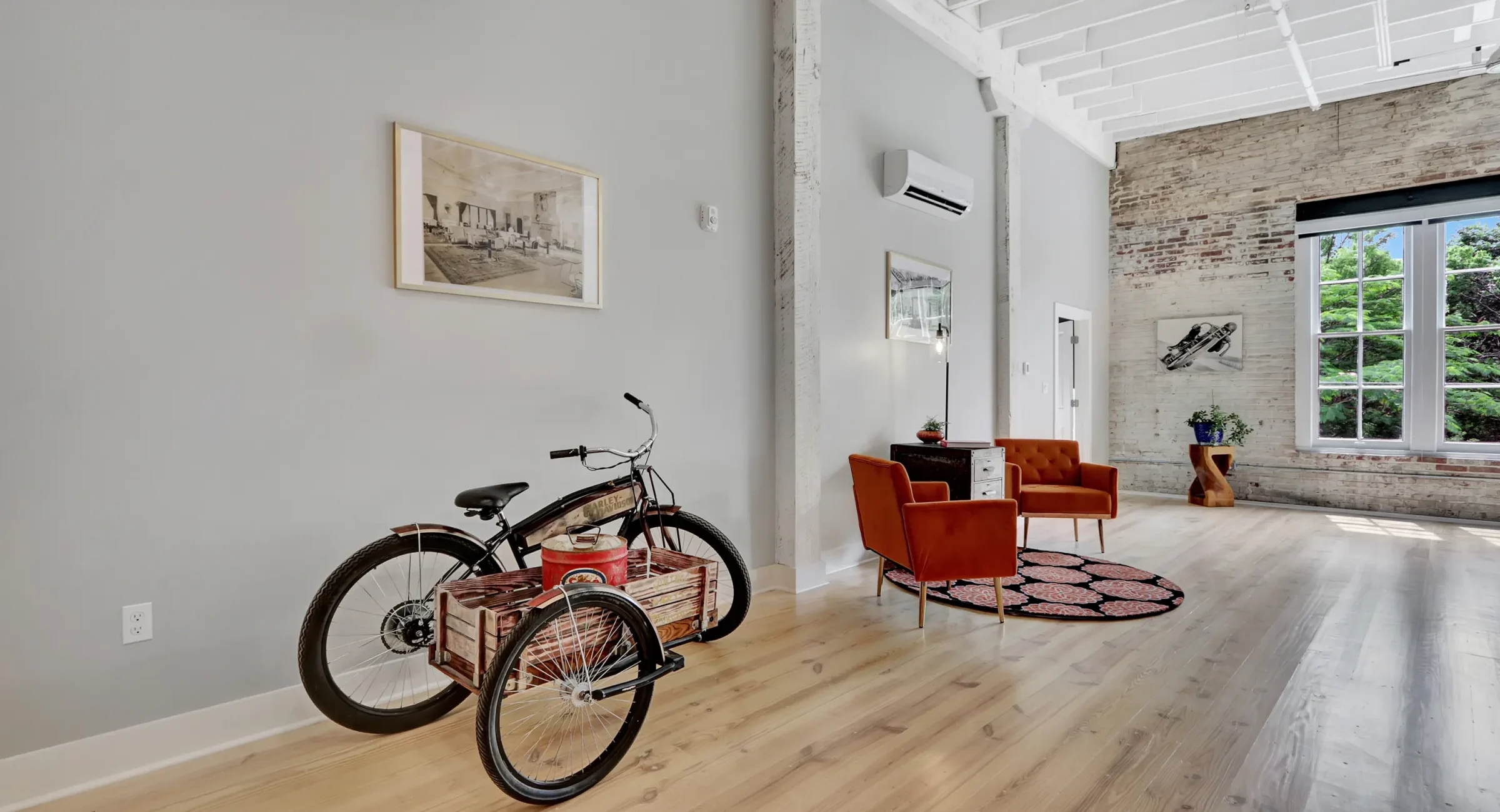 Vintage-style bike decor in spacious industrial living space Central Arkansas accommodations