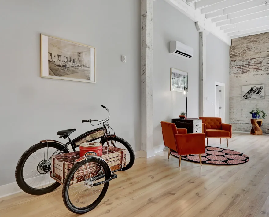 Vintage-style bike decor in spacious industrial living space Central Arkansas accommodations