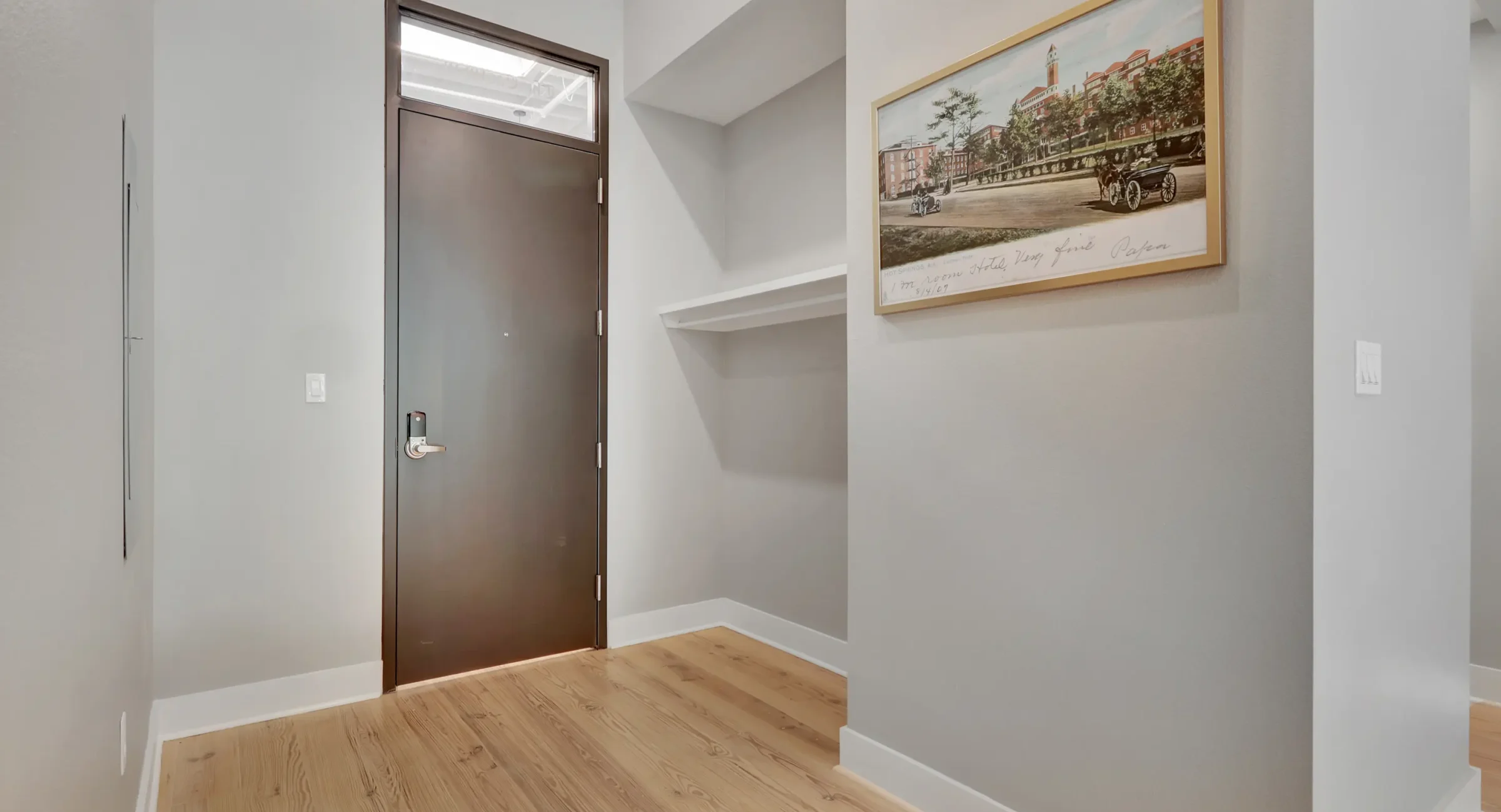 Modern entryway with built-in shelving at lodging near Hot Springs National Park