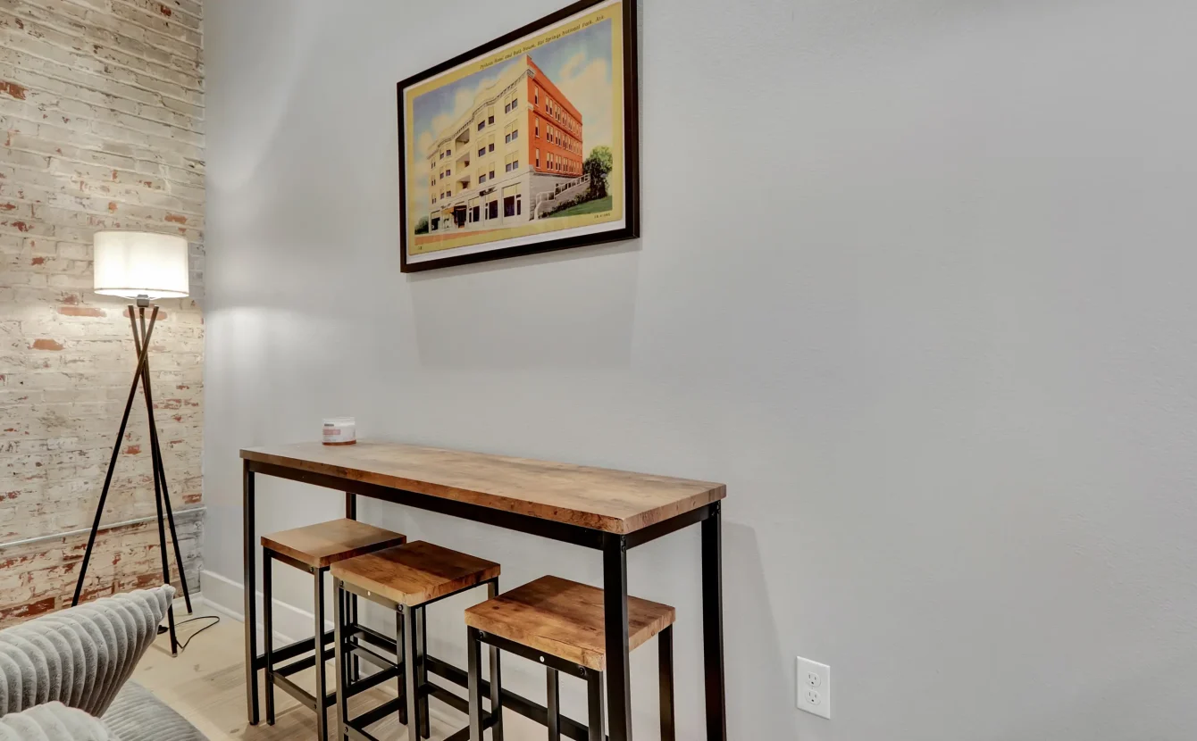 High-top dining table inside boutique hotel lodging in downtown Hot Springs Arkansas