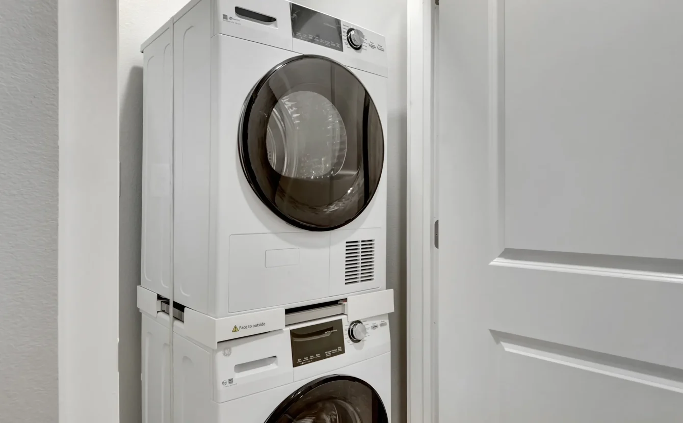 In-unit washer and dryer inside a modern downtown Hot Springs accommodation