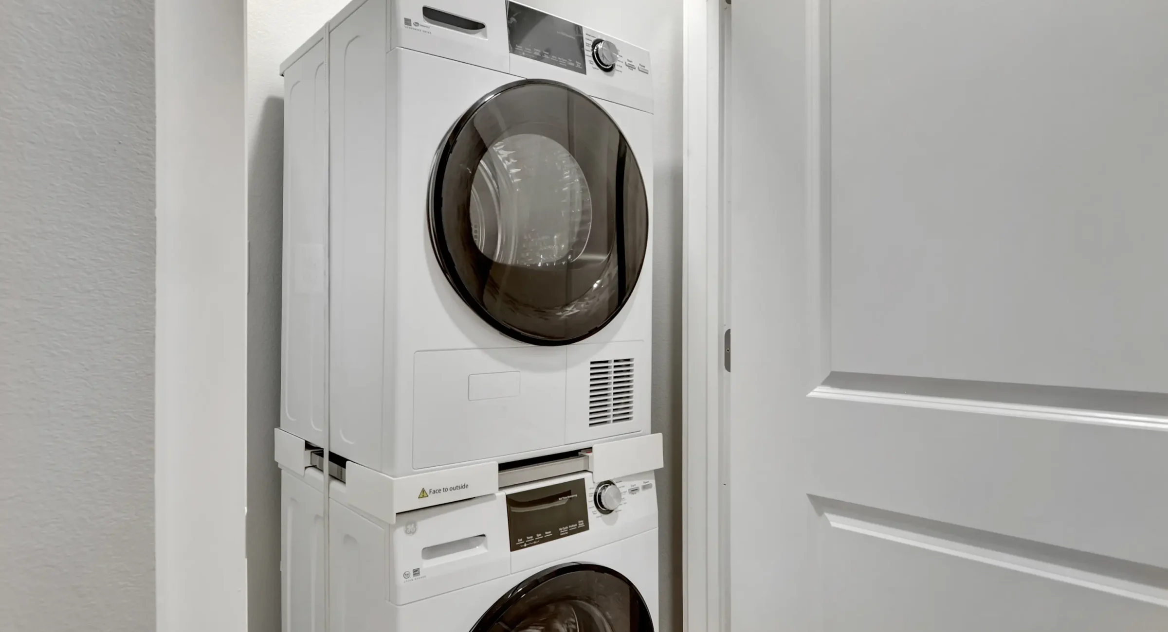 In-unit washer and dryer inside a modern downtown Hot Springs accommodation