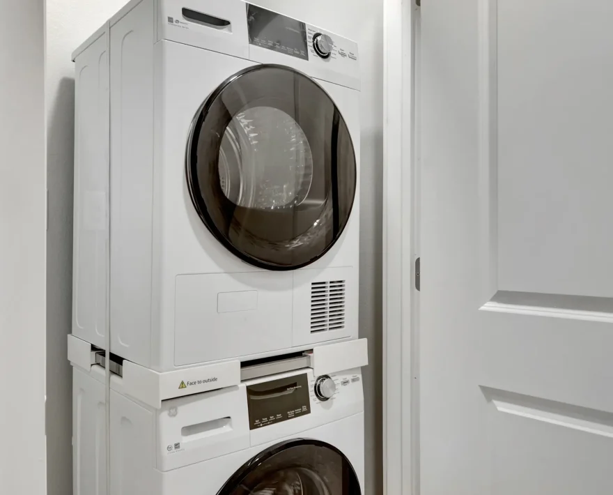 In-unit washer and dryer inside a modern downtown Hot Springs accommodation