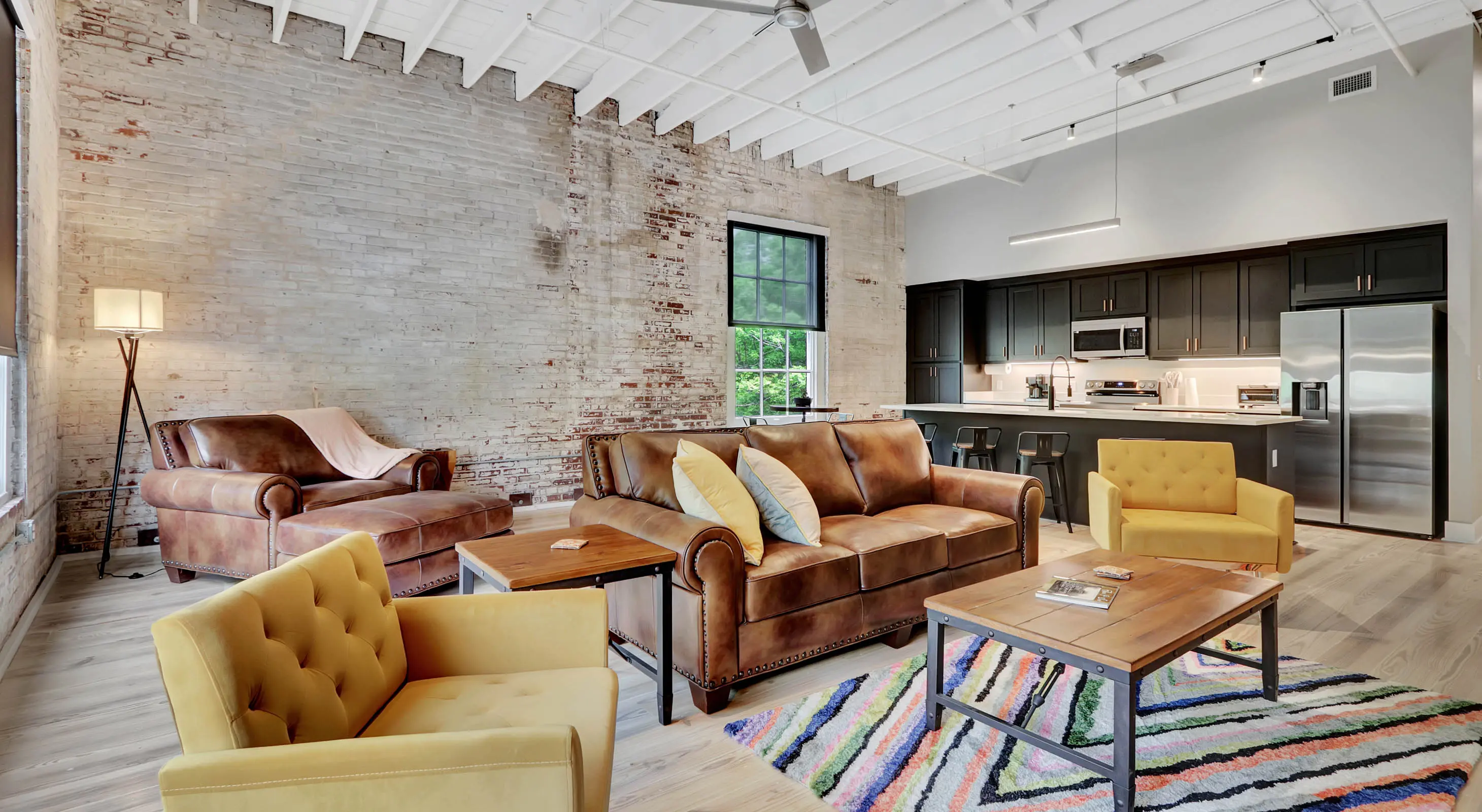 Restored historic interior featuring leather seating and original masonry