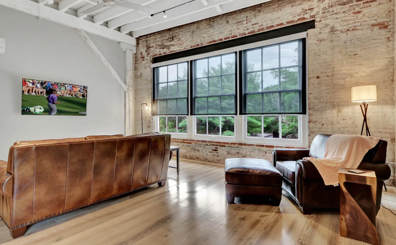 Natural light-filled living space inside a restored Hot Springs building