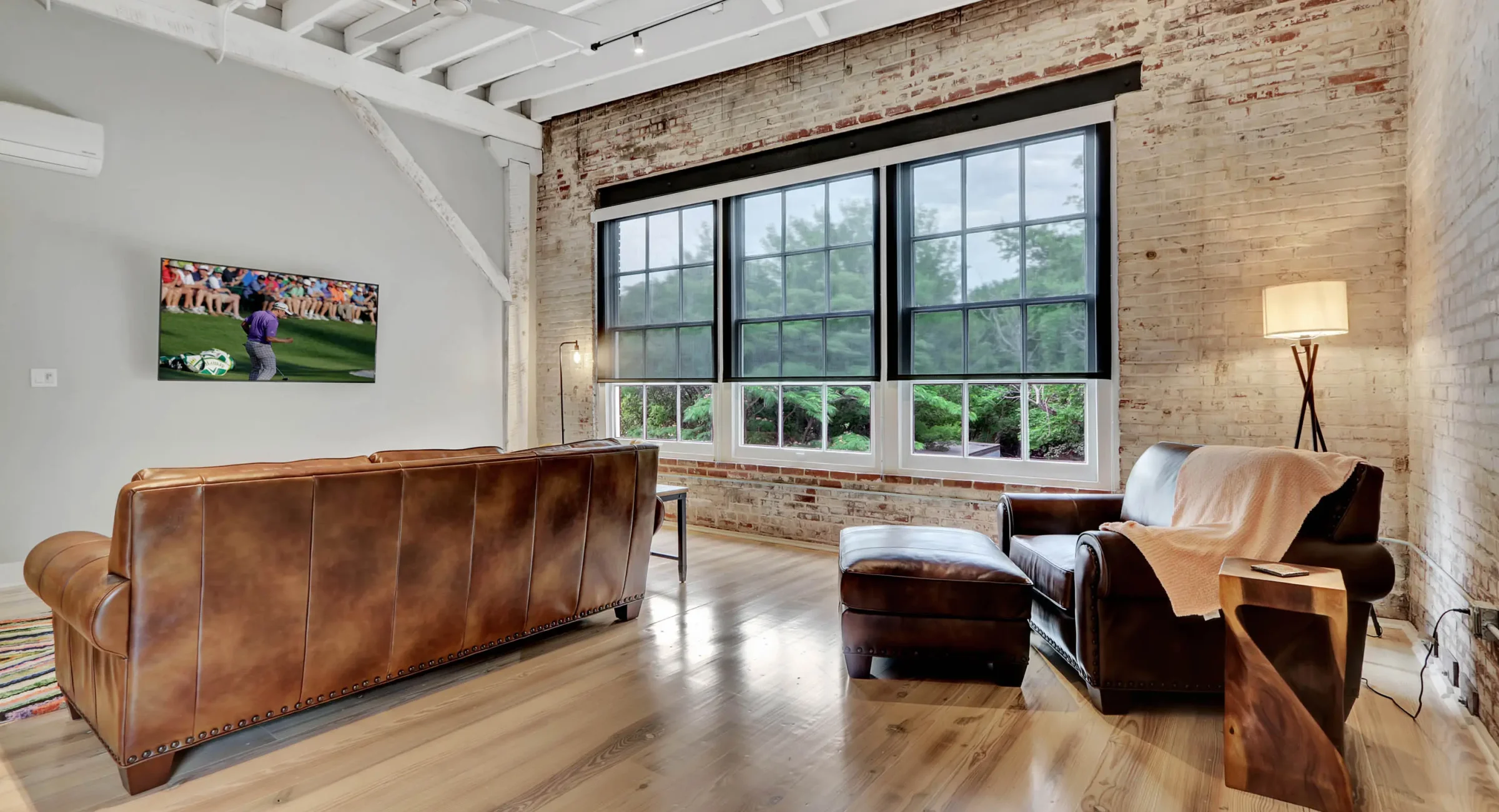 Natural light-filled living space inside a restored Hot Springs building