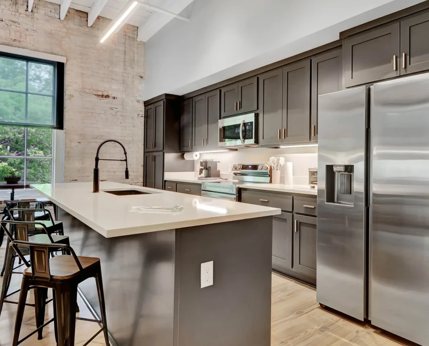 Downtown Hot Springs loft kitchen blending modern finishes with historic structure