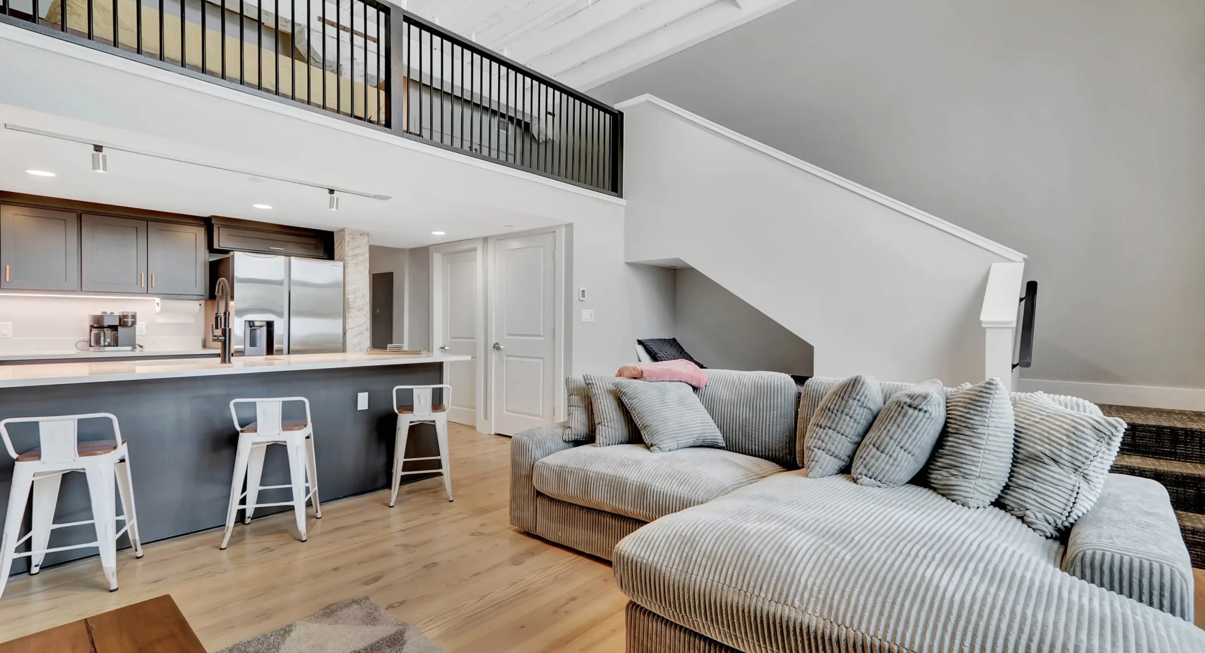 Open-concept living room and kitchen in downtown Hot Springs vacation rental