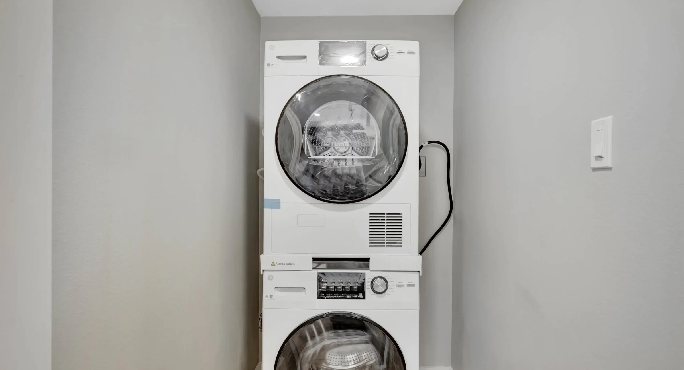 Stacked washer and dryer inside downtown Hot Springs vacation rental