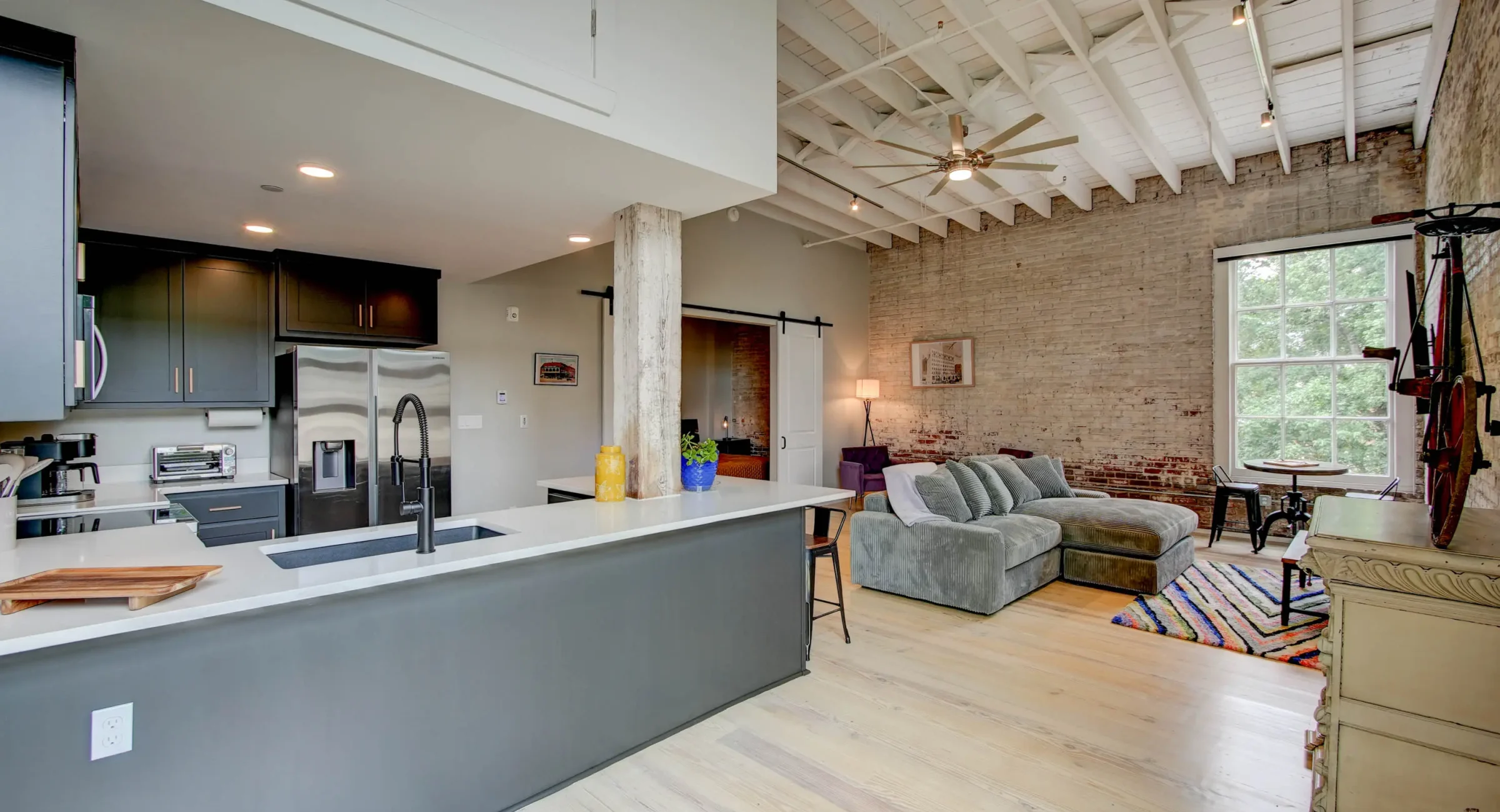 Open kitchen and living space in downtown Hot Springs loft rental