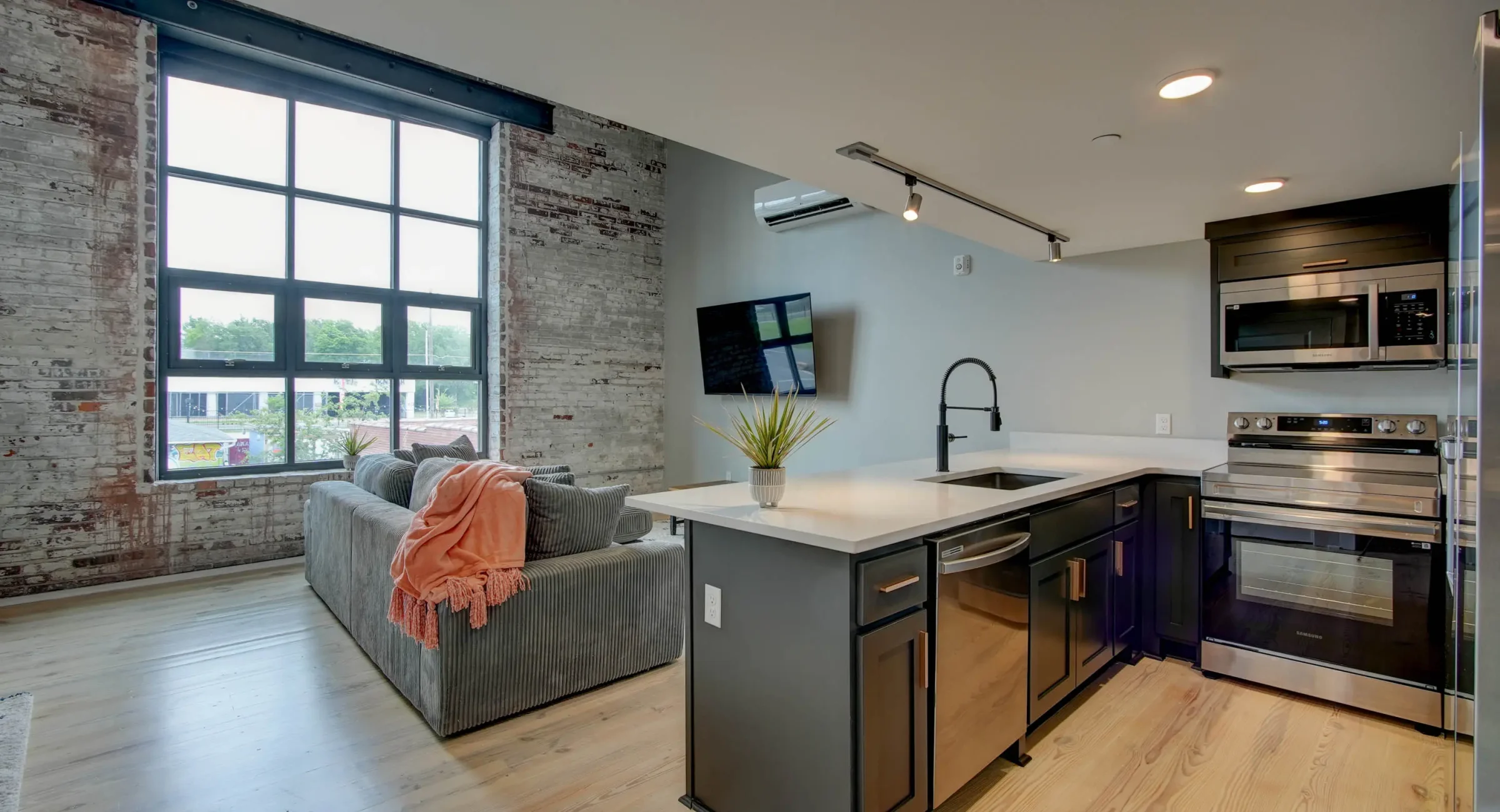 Open-concept kitchen and living area in historic Hot Springs loft