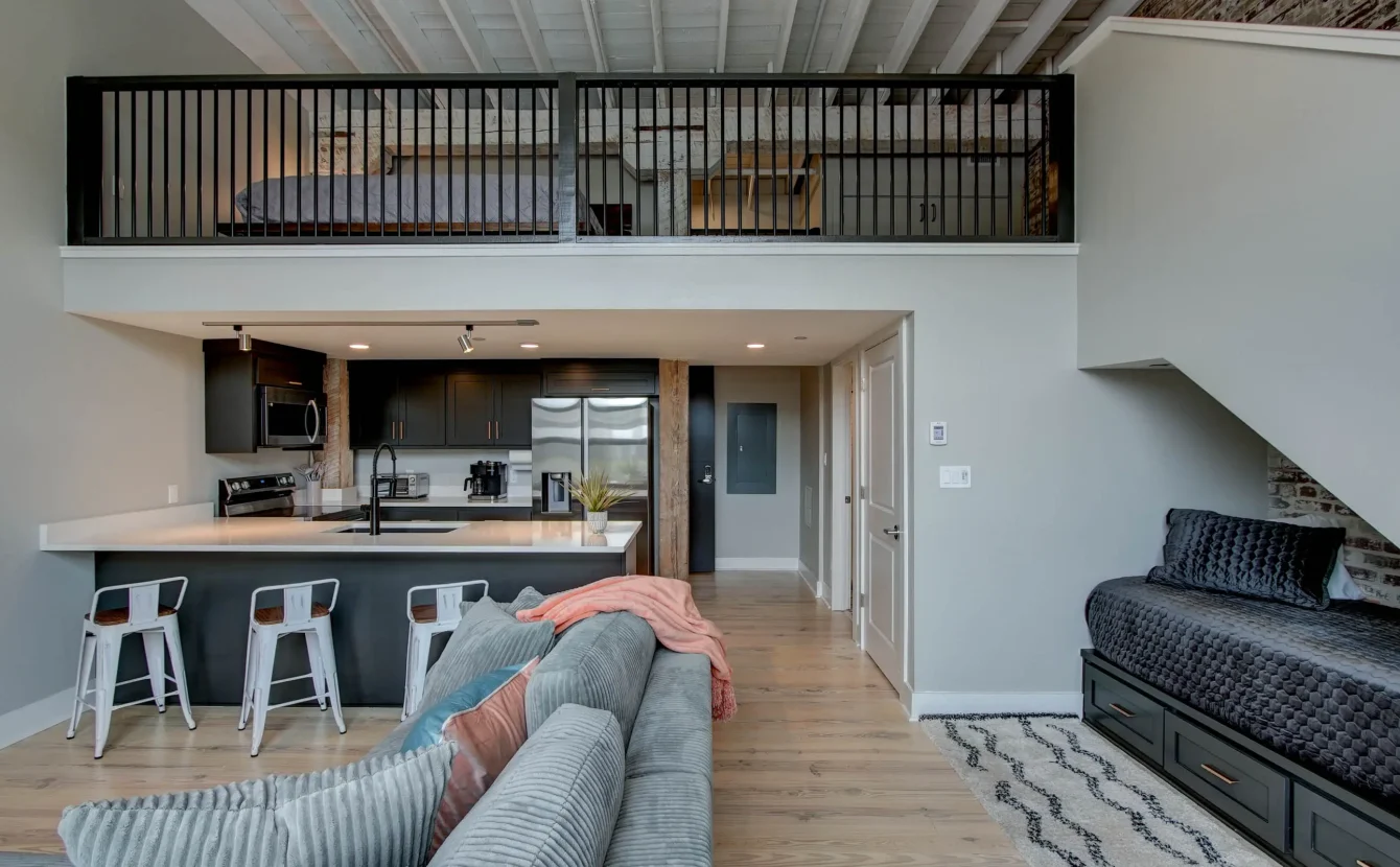 Open kitchen and dining space with mezzanine level in downtown Hot Springs lodging