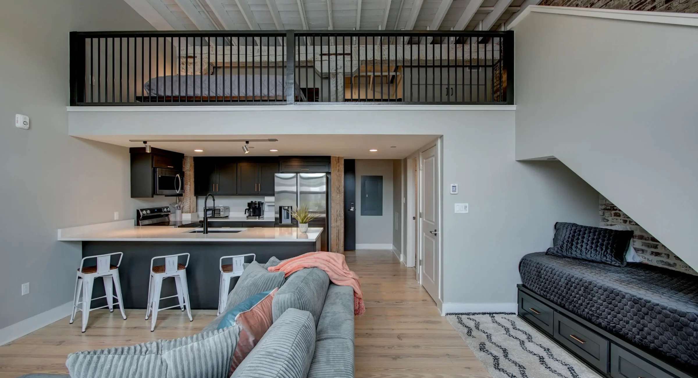 Open kitchen and dining space with mezzanine level in downtown Hot Springs lodging