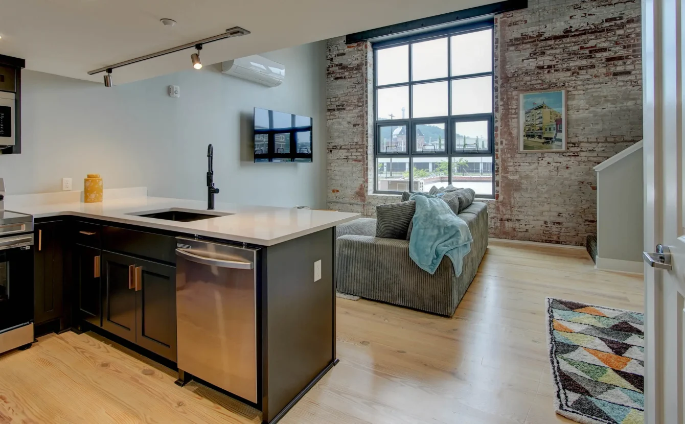 Open-concept loft living space with full kitchen in downtown Hot Springs, Arkansas