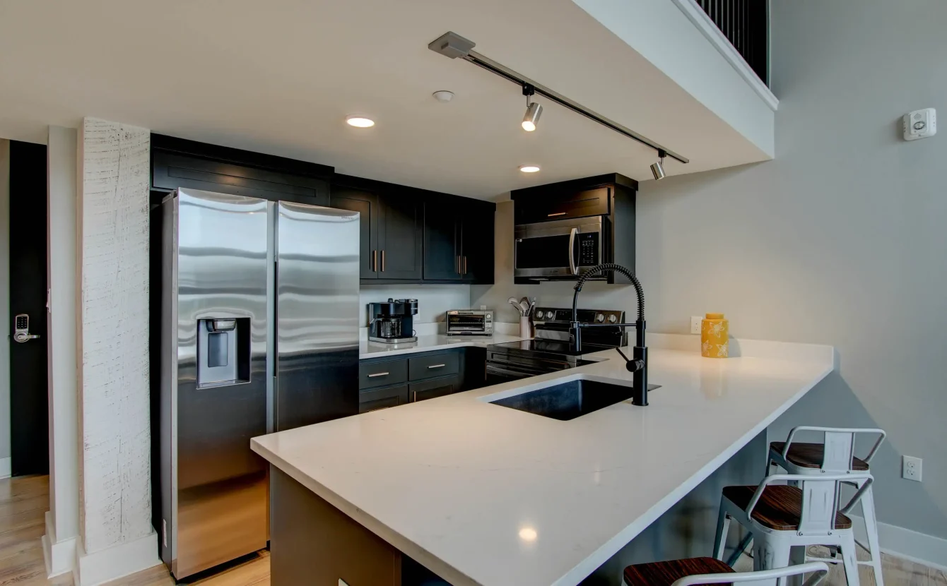 Modern kitchen with breakfast bar in downtown Hot Springs vacation rental
