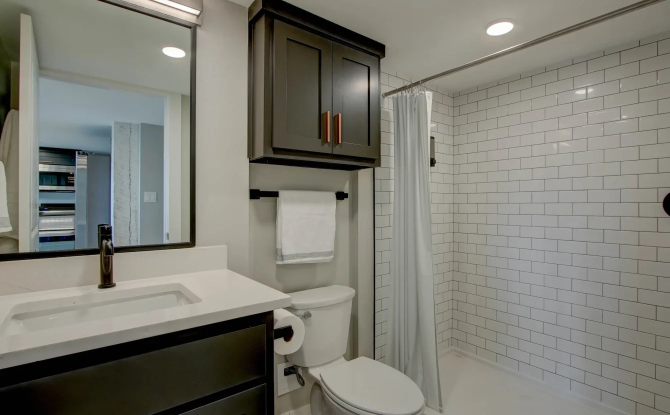 Modern bathroom with walk-in shower in downtown Hot Springs lodging