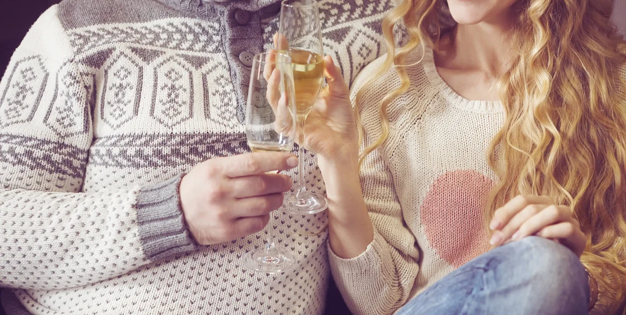 Couple enjoying champagne during a romantic getaway in downtown Hot Springs