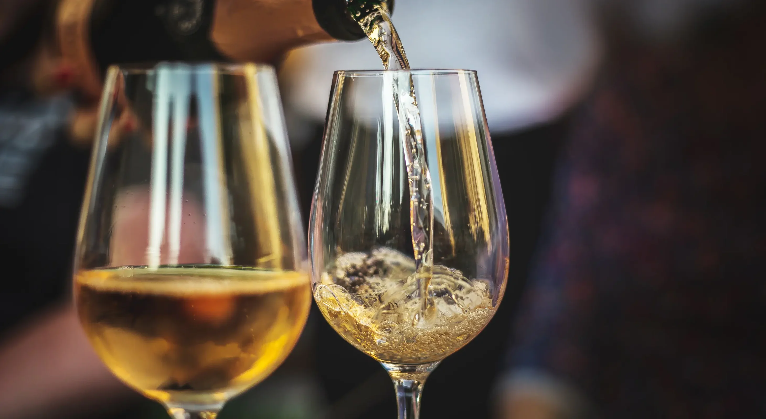 Champagne being poured for a romantic stay in downtown Hot Springs, Arkansas