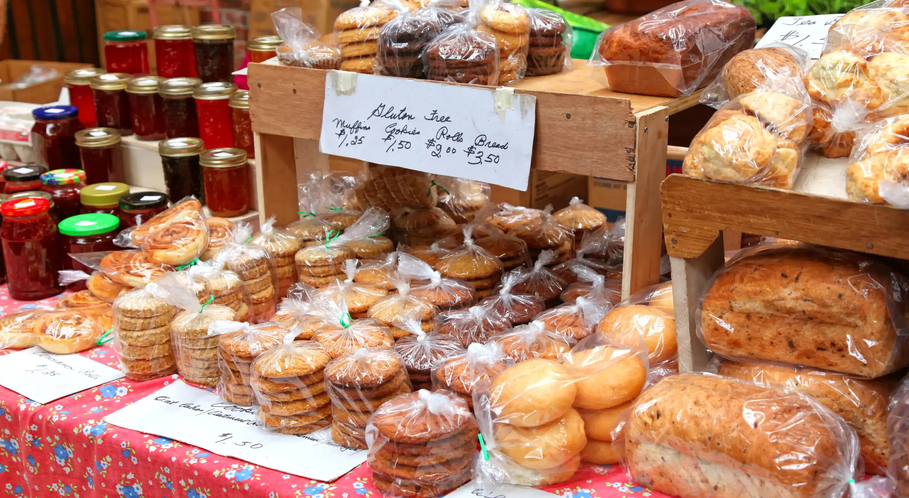 Baked goods and greens at Hot Springs farmers market in early Spring